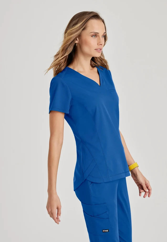Greys Anatomy Capri Tuck-in Two Pocket Top