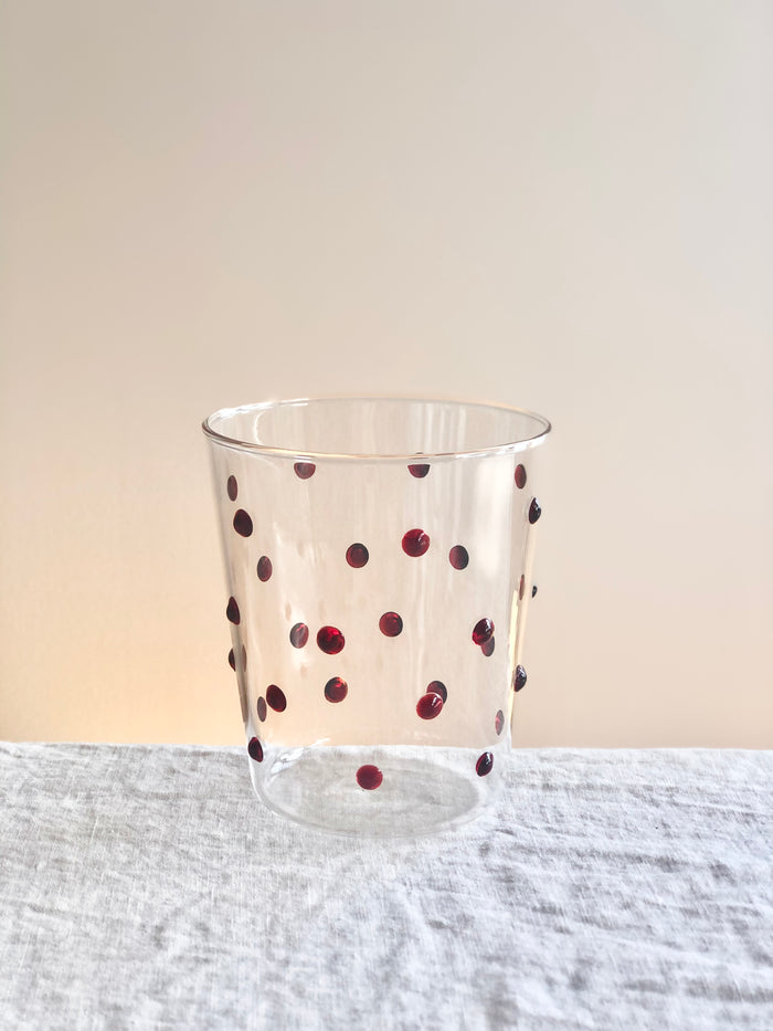 clear glass tumblers with red glass dots