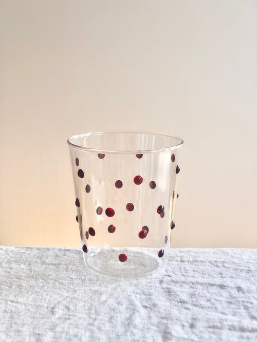 clear glass tumblers with red glass dots