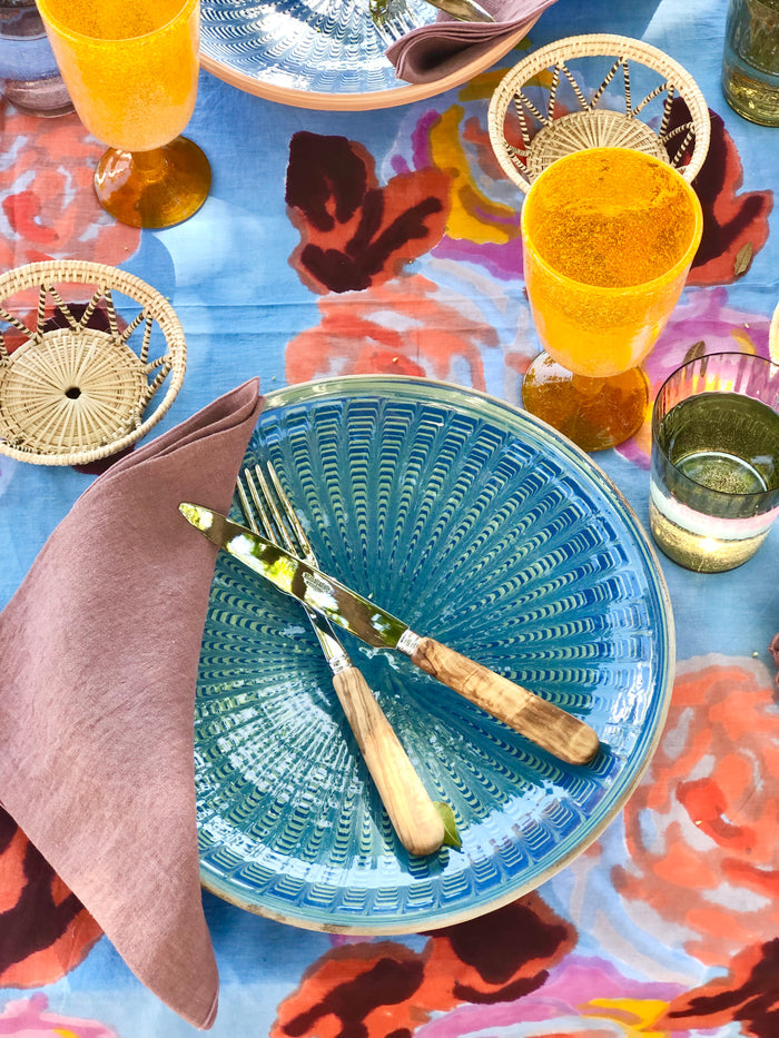 mauve linen rolled edge linen napkins with mauve edge 18 inches square on blue peacock bowl