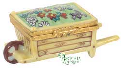 SKU# 6033 - Wheel Barrow Wood With Flowers