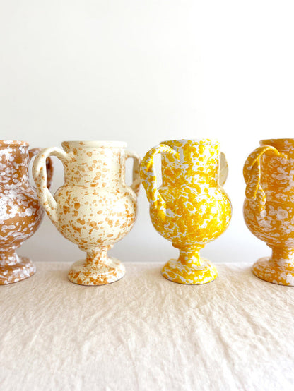 small white amphora vase with light brown speckle pattern 8.25 inches tall in group of four