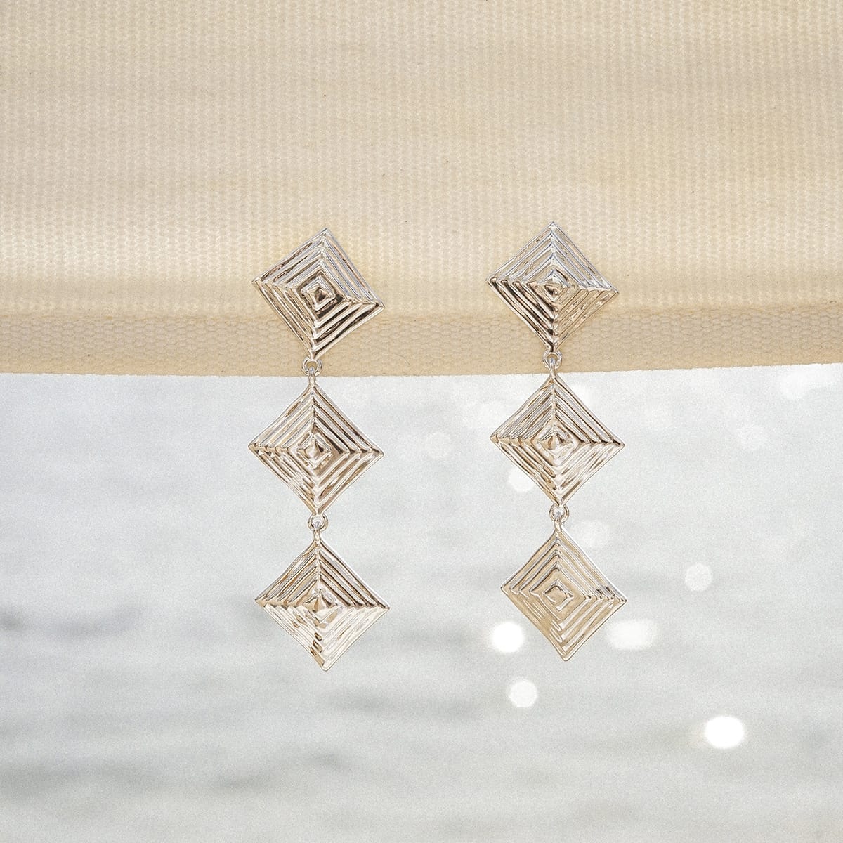 Strata Triple Drop Earrings Silver Plate